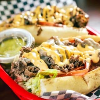 King Sauce drizzled over a cheesesteak